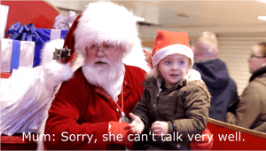 Santa signing to child